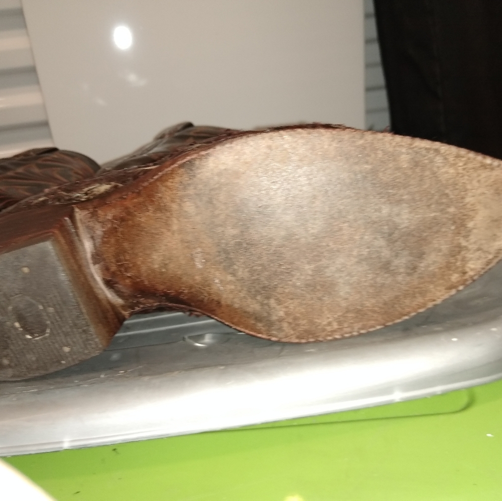 Western Cowboy boots, by Dan Post. Have been resoled and also the heels,